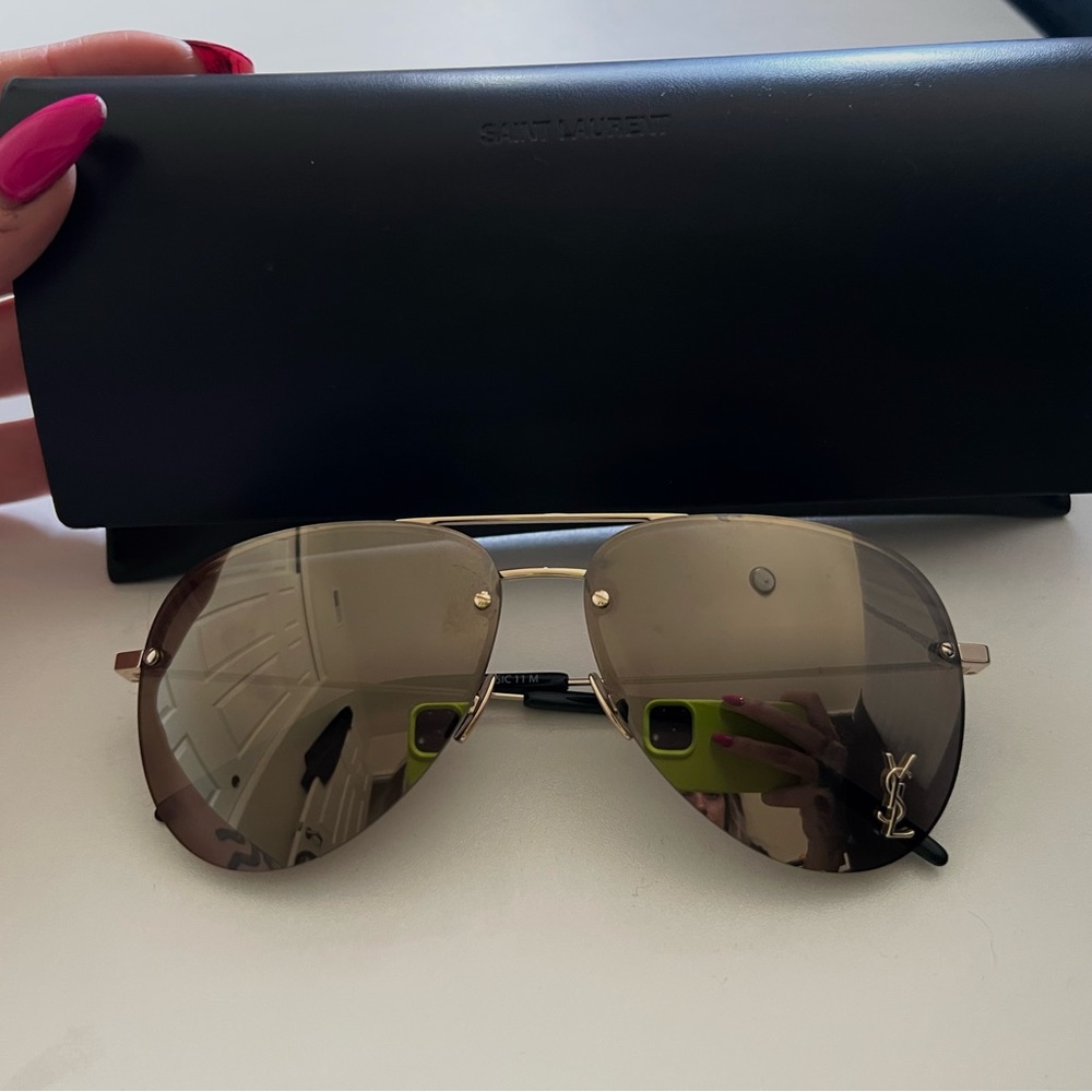 Yves Saint Laurent sunglasses gold case and cloth included